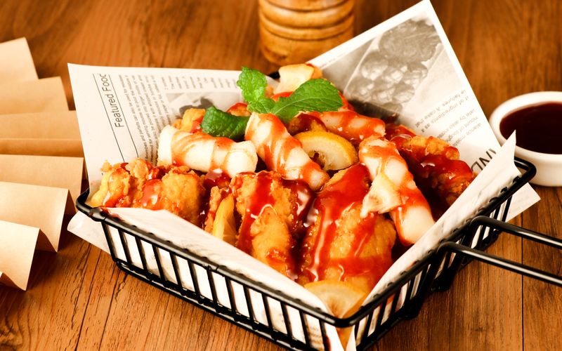 Spicy Sauced Tenders Wings over